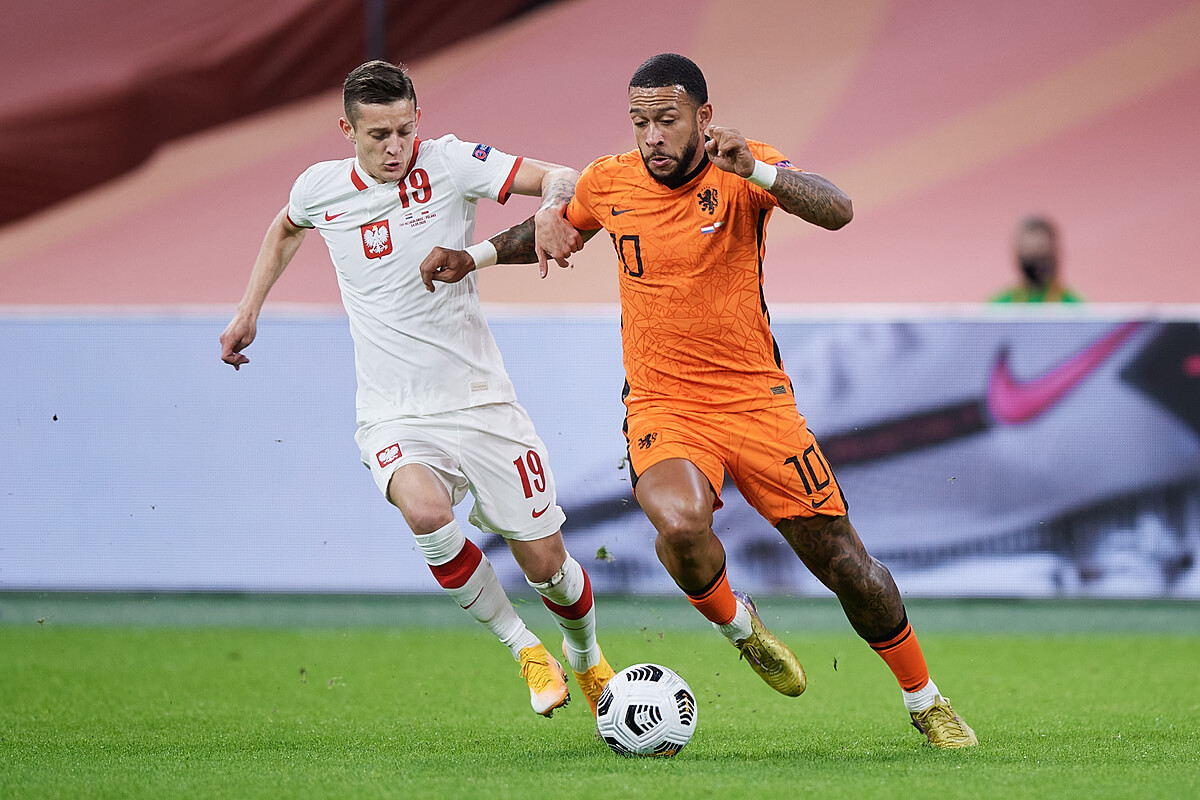 Sebastian Szymański i Memphis Depay