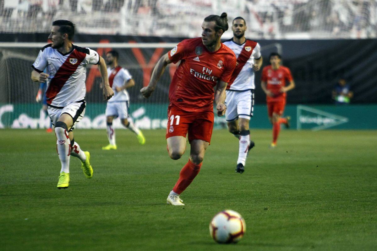Piłkarze Ryo Vallecano i Realu Madryt