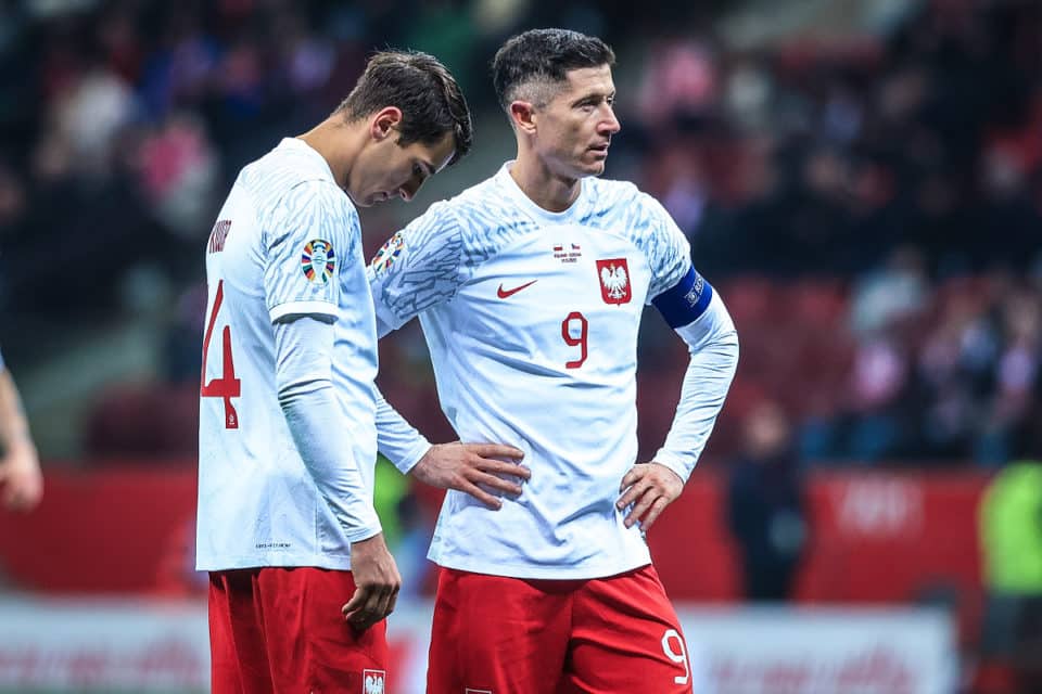 Jakub Kiwior i Robert Lewandowski
