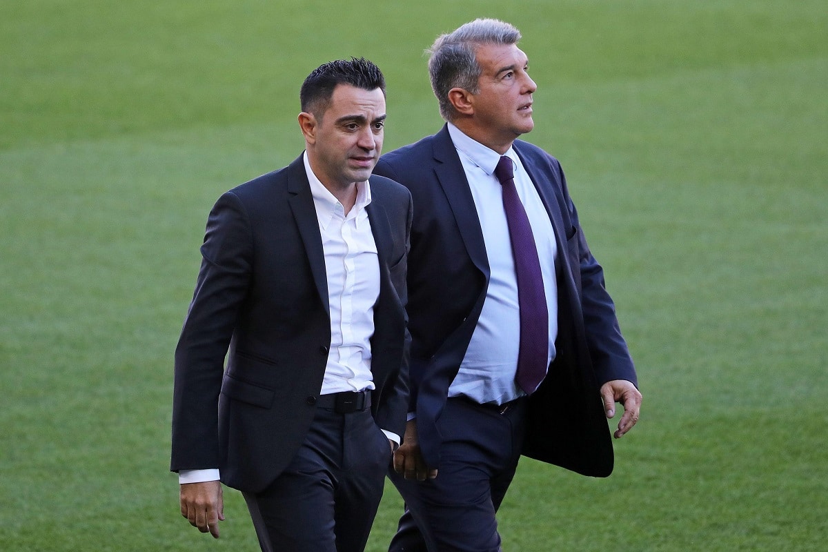 Xavi Hernandez i Joan Laporta