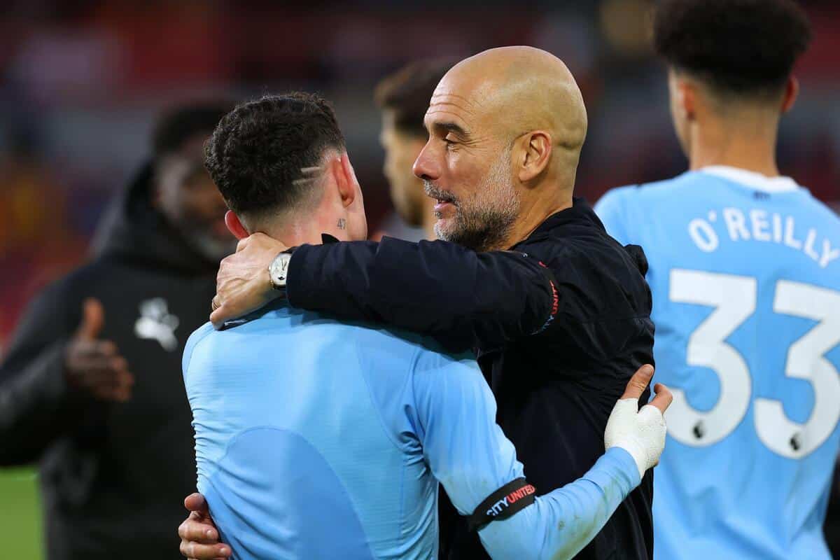 Phil Foden i Pep Guardiola
